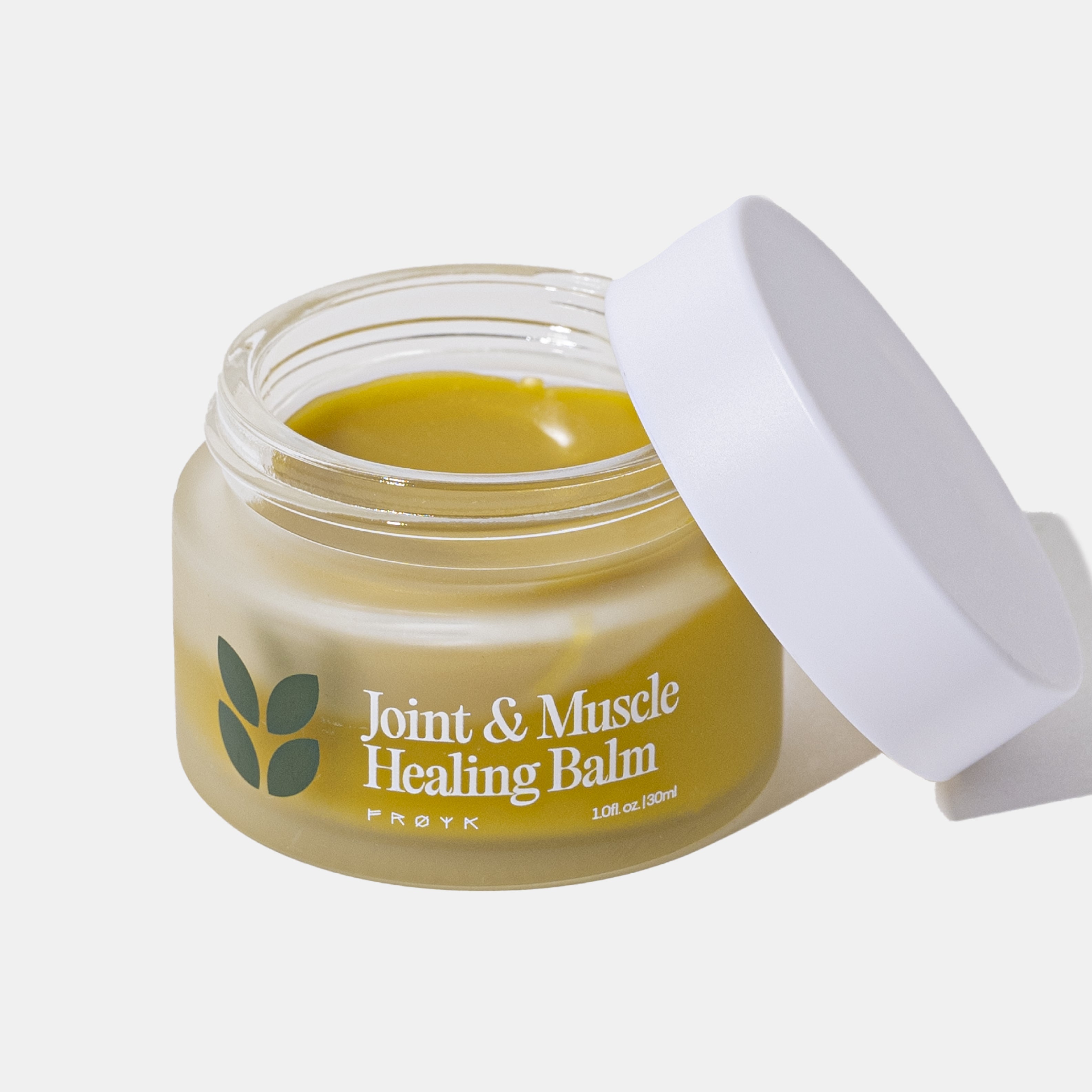 Frøya Organics Joint & Muscle Healing Balm in glass jar with lid – organic joint relief balm front view
